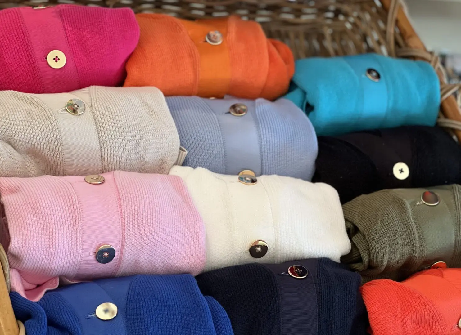 Folded cardigans of varying colors